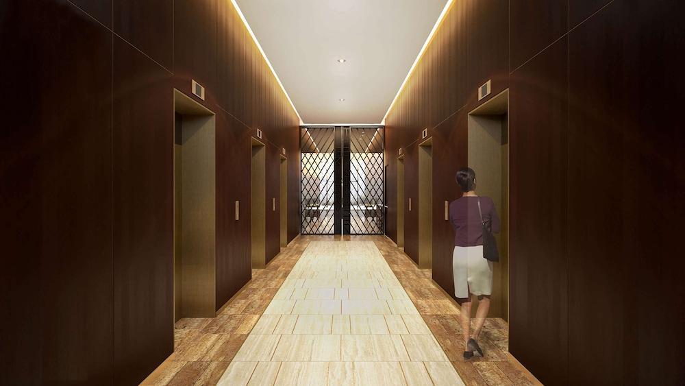 Aleph Doha Residences, Curio Collection By Hilton Exterior foto The elevators