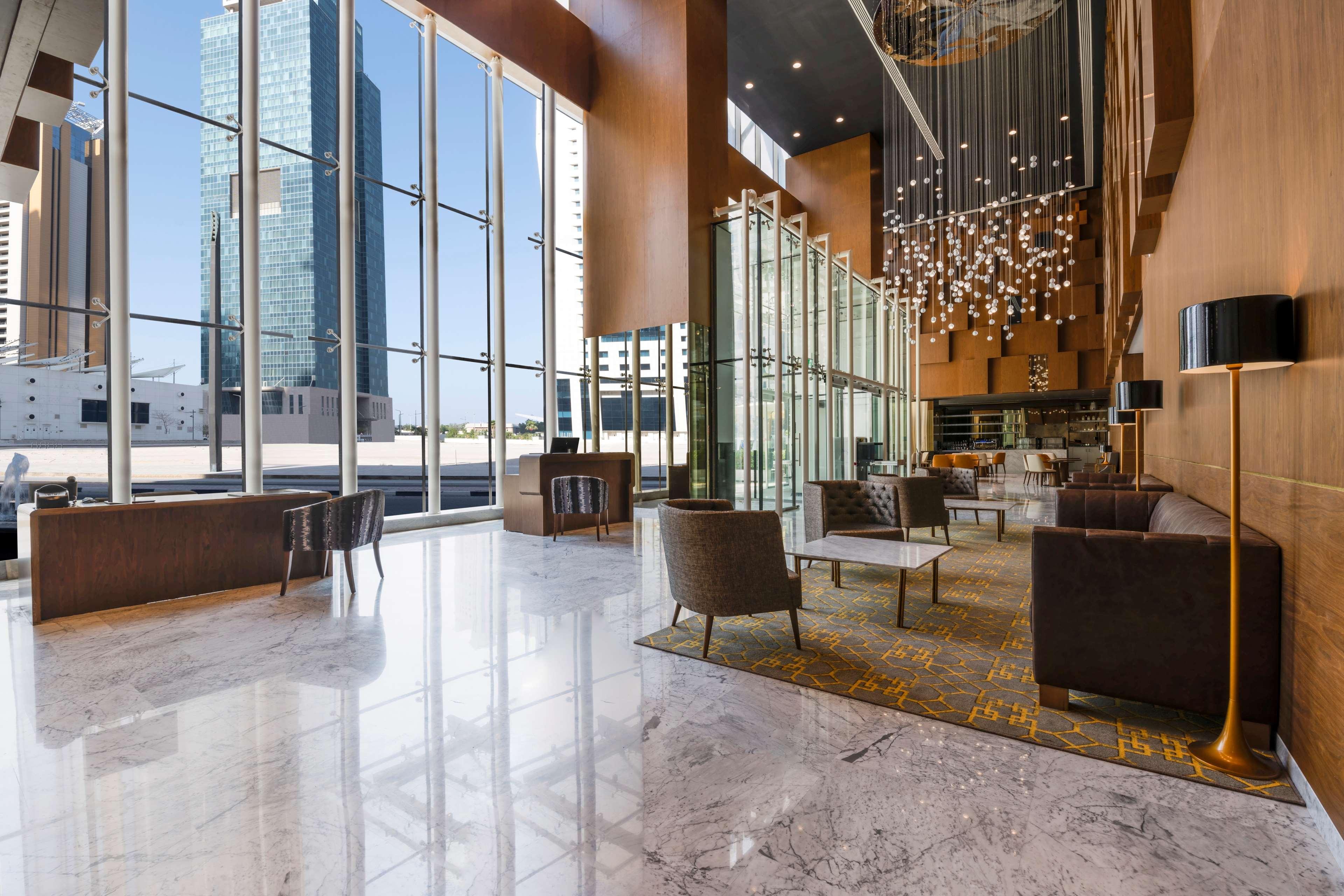 Aleph Doha Residences, Curio Collection By Hilton Exterior foto The lobby of the hotel
