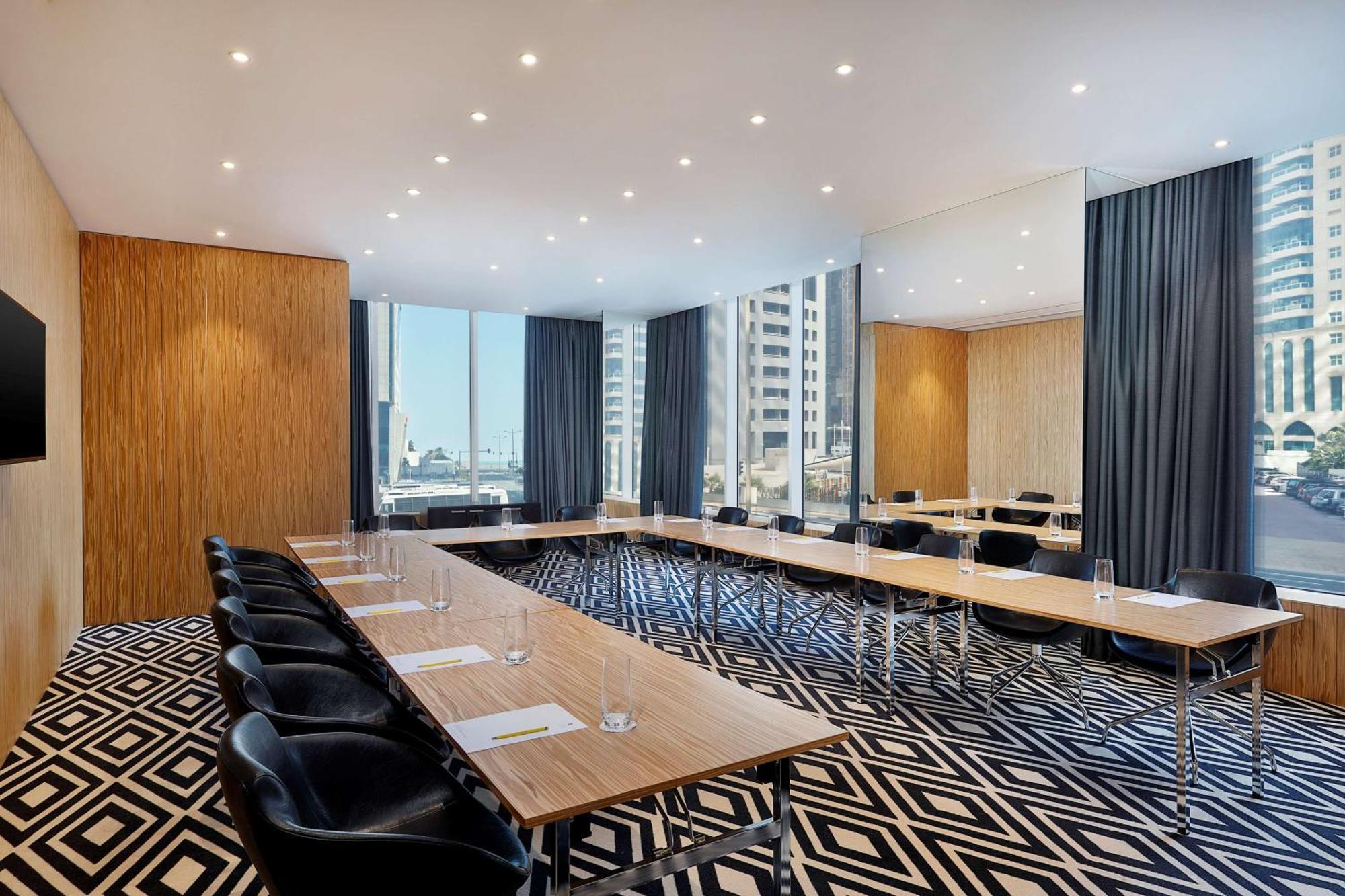 Aleph Doha Residences, Curio Collection By Hilton Exterior foto Meeting room