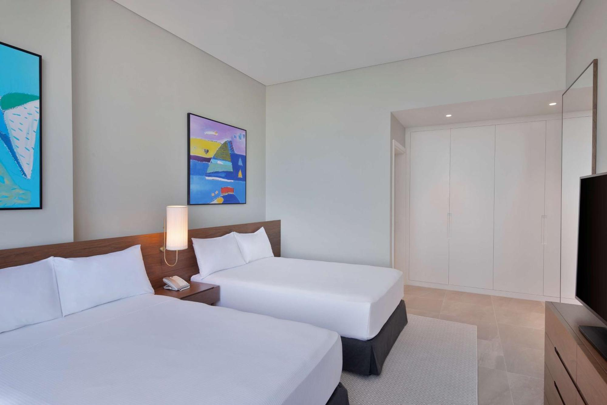 Aleph Doha Residences, Curio Collection By Hilton Exterior foto Guest room