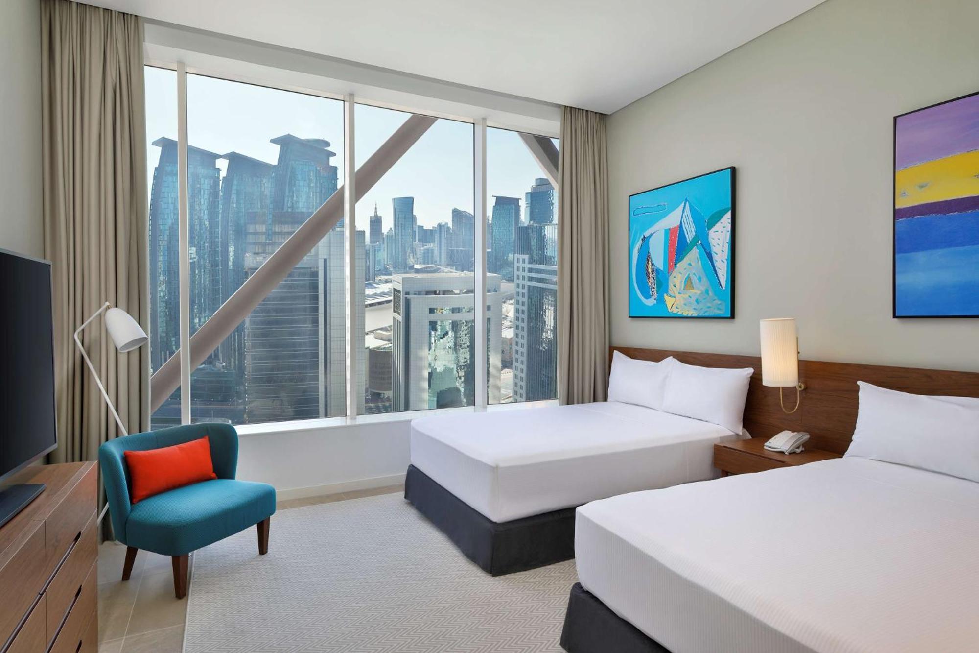 Aleph Doha Residences, Curio Collection By Hilton Exterior foto A guest room at the hotel