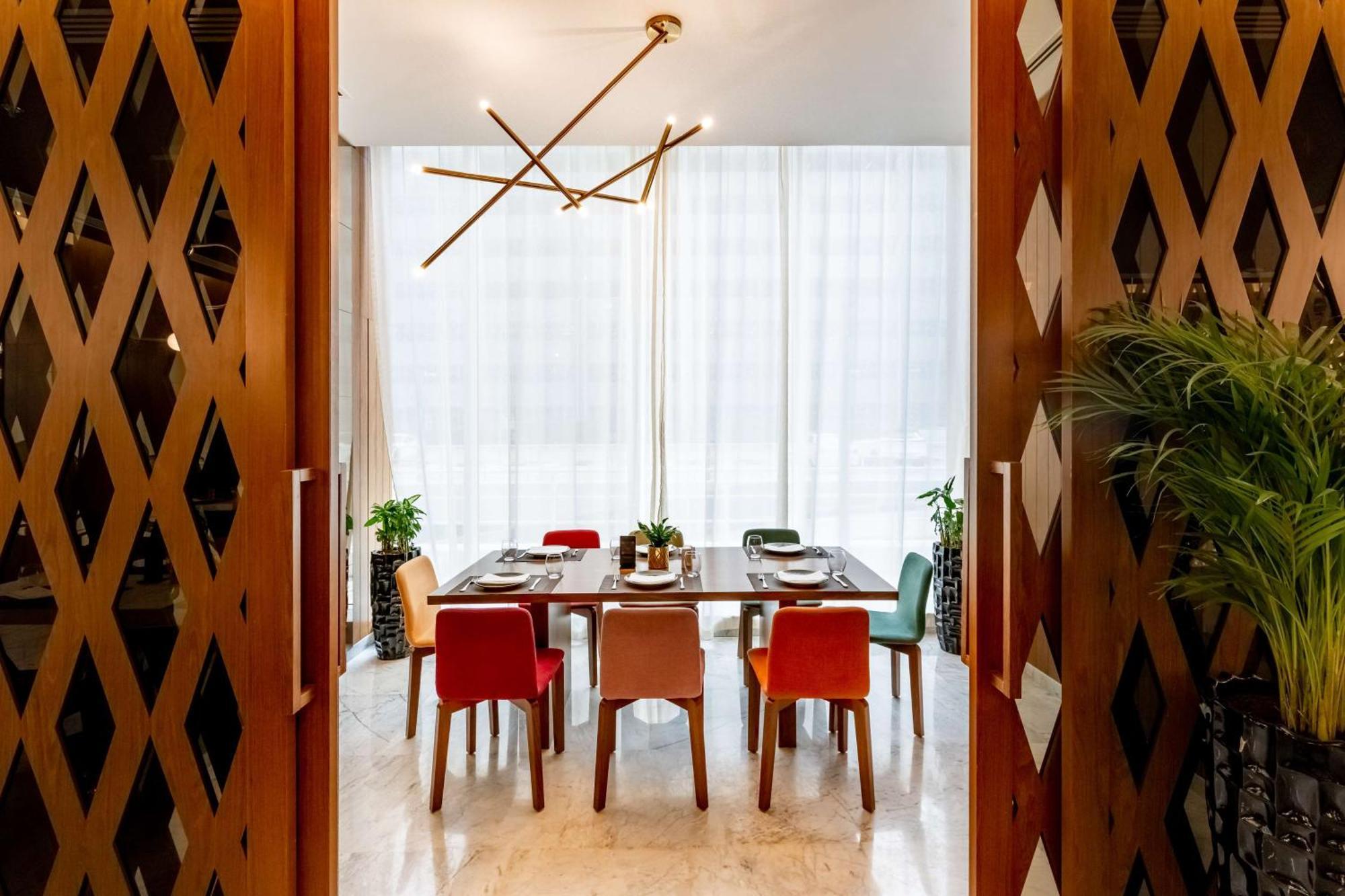 Aleph Doha Residences, Curio Collection By Hilton Exterior foto Dining room