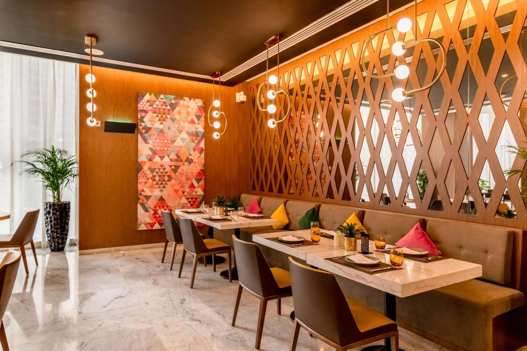 Aleph Doha Residences, Curio Collection By Hilton Exterior foto The interior of the restaurant